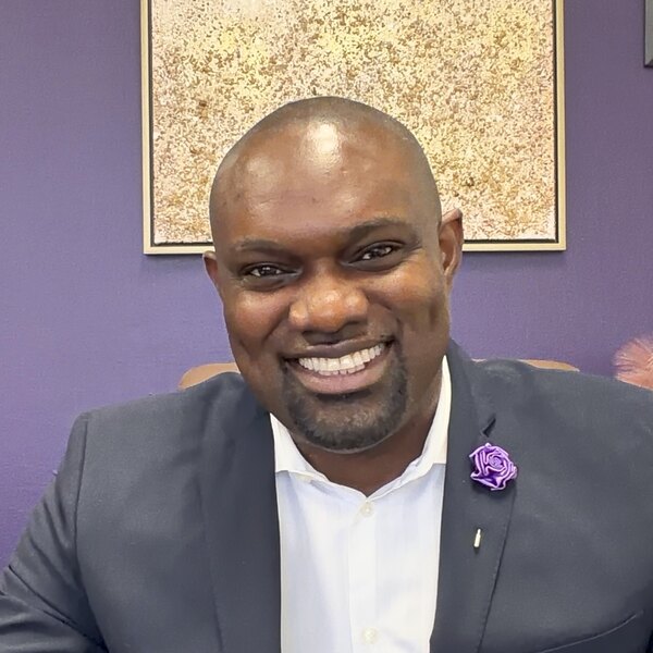 Headshot of Ebot Mbi, CPA, EA